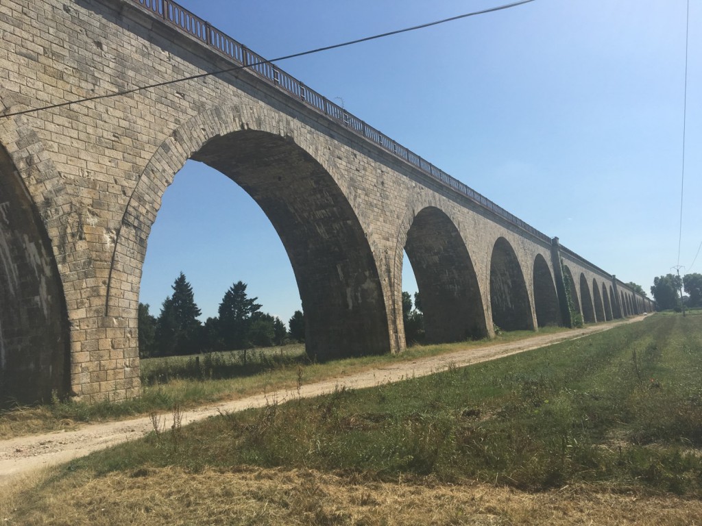 A really cool arch, that must be about 100 years old at least. Why not just make is solid? I am sure there is a very good reason. It leads to a bridge of sorts.