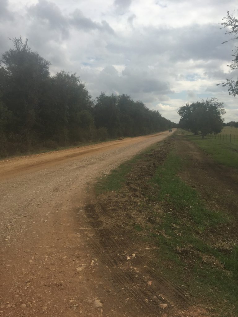 Rocky road on the south side of the tracks